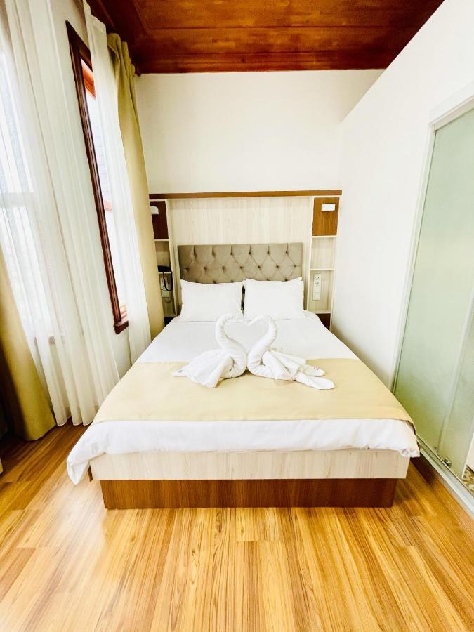 Qonaq Hotel & Suites Стамбул Экстерьер фото